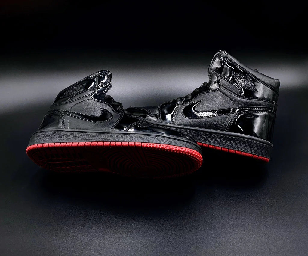 Jordan Air 1 Retro High Black Demon Suela Roja